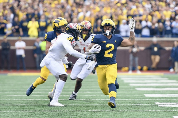 Ronnie Bell (8) and Blake Corum (2)