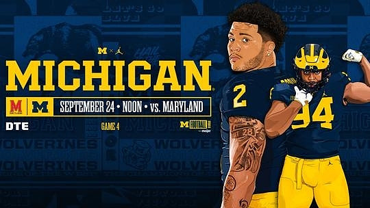 Blake Corum (2) and Kris Jenkins (94)