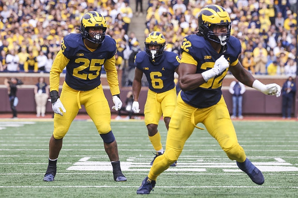 Junior Colson (25), R.J. Moten (6), and Jaylen Harrell (32)