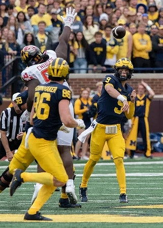 Luke Schoonmaker (86) and J.J. McCarthy (9)