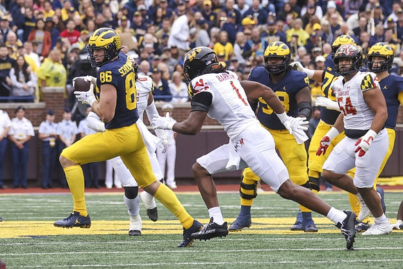 Luke Schoonmaker (86), Trente Jones (53), Ryan Hayes (76), and J.J. McCarthy (9)