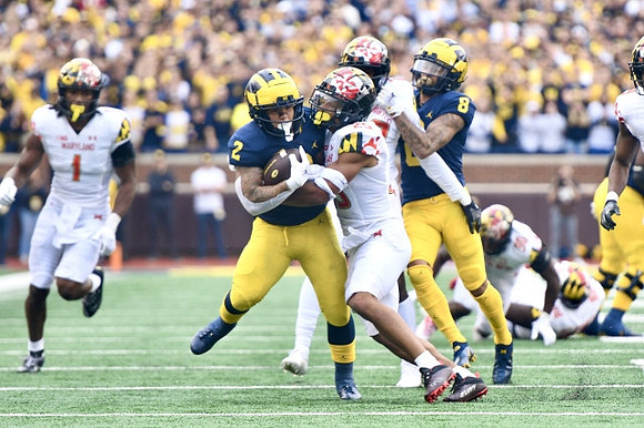 Blake Corum (2) and Ronnie Bell (8)