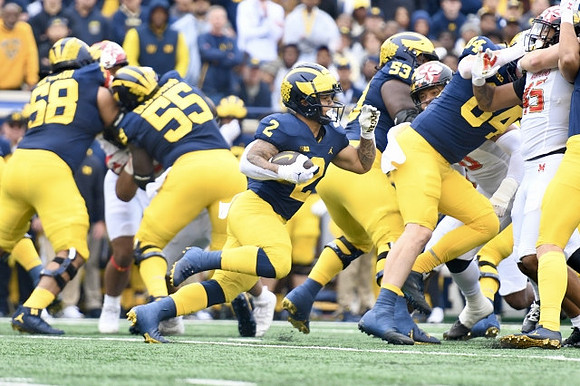 Giovanni El-Hadi (58), Olusegun Oluwatimi (55), Blake Corum (2), Trente Jones (53), and Joel Honigford (84)