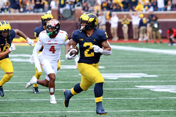 Giovanni El-Hadi (58), J.J. McCarthy (9), and Blake Corum (2)