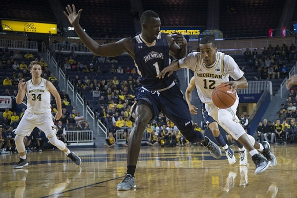 Mark Donnal (34) and Muhammad-Ali Abdur-Rahkman (12)