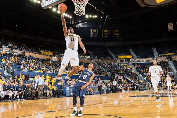 Derrick Walton Jr. (10) and Muhammad-Ali Abdur-Rahkman (12)