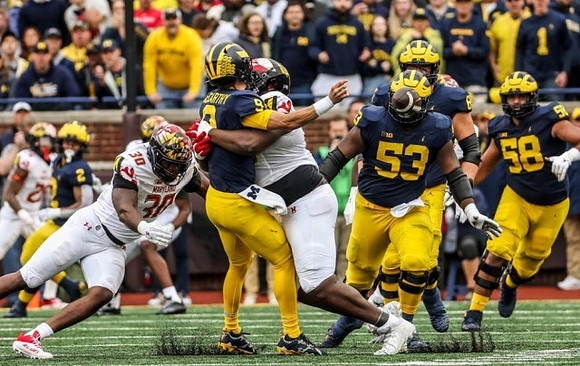 J.J. McCarthy (9), Trente Jones (53), and Giovanni El-Hadi (58)