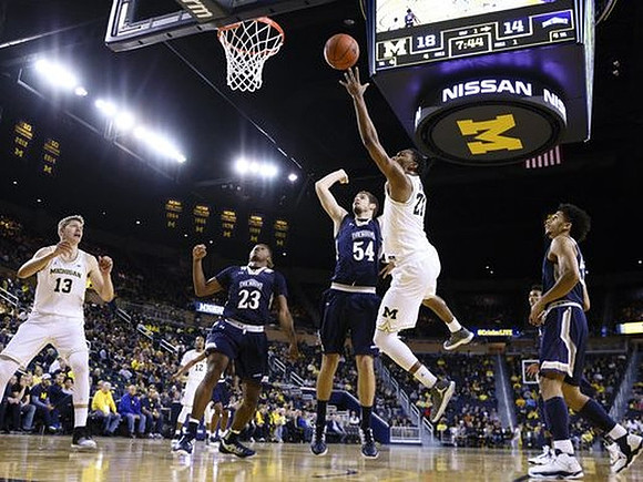 Moritz Wagner (13), Muhammad-Ali Abdur-Rahkman (12), and Zak Irvin (21)