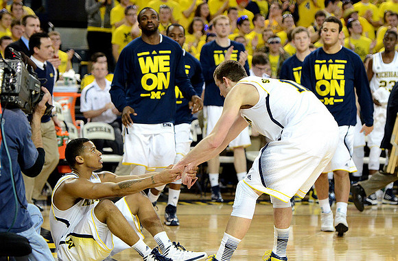 Trey Burke (3), Nik Stauskas (11), Corey Person (32), Eso Akunne (5), and Josh Bartelstein (20)