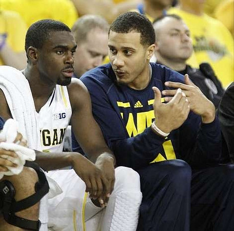 Tim Hardaway Jr. (10) and Jordan Morgan (52)