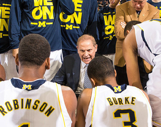 Glenn Robinson III (1), Trey Burke (3), and John Beilein