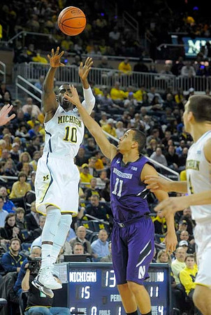 Tim Hardaway Jr. (10) and Mitch McGary (4)
