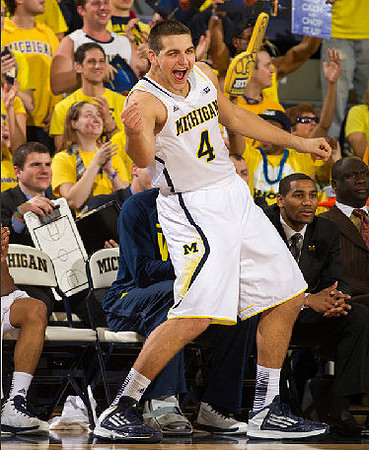 Mitch McGary (4) and LaVall Jordan
