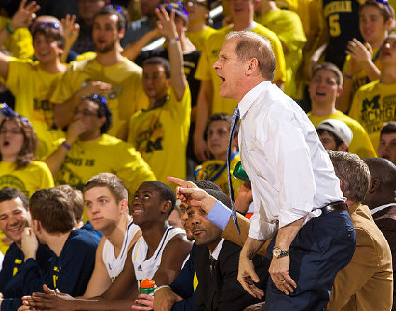Max Bielfeldt (44), Caris LeVert (23), LaVall Jordan, and John Beilein