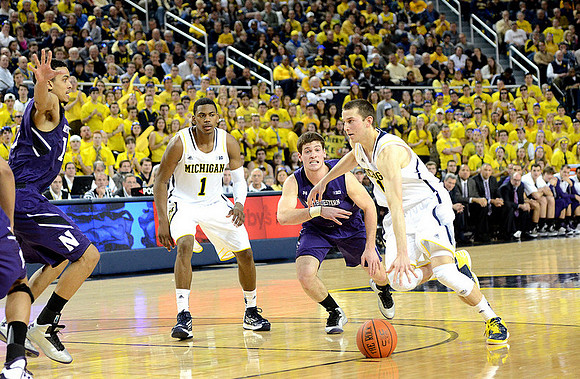 Glenn Robinson III (1) and Nik Stauskas (11)