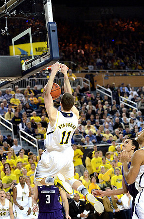 Nik Stauskas (11) and Jon Horford (15)
