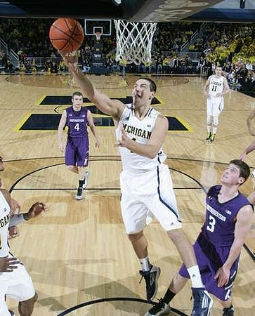 Mitch McGary (4) and Nik Stauskas (11)
