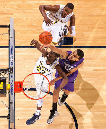 Caris LeVert (23) and Glenn Robinson III (1)