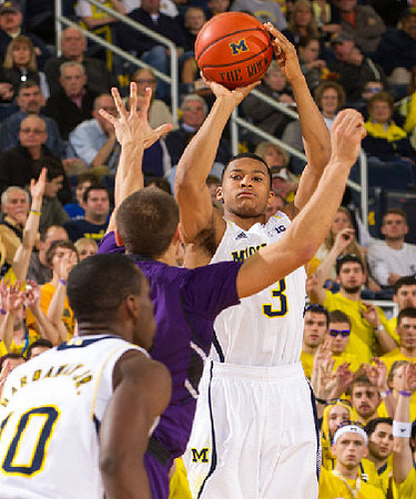 Trey Burke (3) and Tim Hardaway Jr. (10)