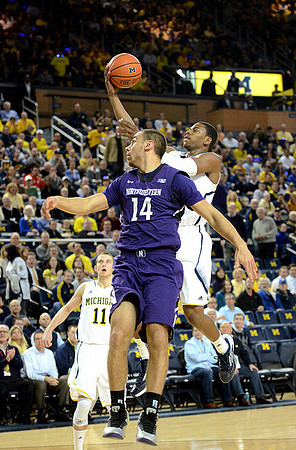 Nik Stauskas (11) and Glenn Robinson III (1)