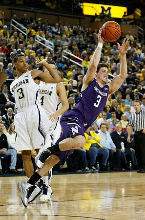 Trey Burke (3) and Mitch McGary (4)