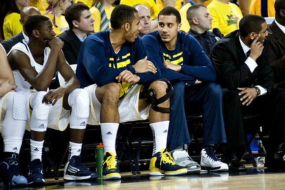 Caris LeVert (23), Jon Horford (15), Jordan Morgan (52), and LaVall Jordan
