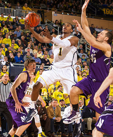 Glenn Robinson III (1) and Nik Stauskas (11)