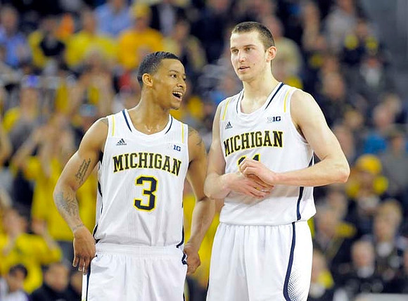Trey Burke (3) and Nik Stauskas (11)