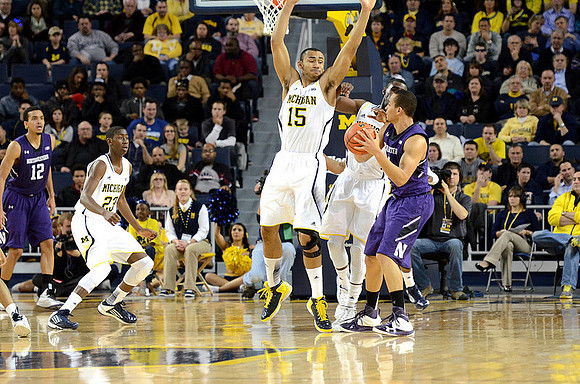 Caris LeVert (23), Jon Horford (15), and Tim Hardaway Jr. (10)