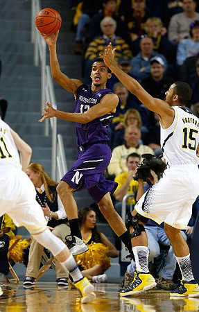 Nik Stauskas (11) and Jon Horford (15)