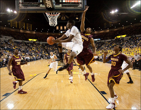 Jordan Morgan (52), Tim Hardaway Jr. (10), and Darius Morris (4)