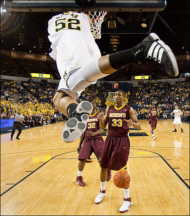 Jordan Morgan (52) and Zack Novak (0)