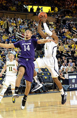 Nik Stauskas (11) and Glenn Robinson III (1)
