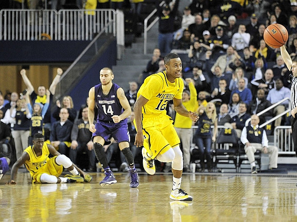 Caris LeVert (23) and Muhammad-Ali Abdur-Rahkman (12)