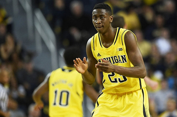 Caris LeVert (23) and Derrick Walton Jr. (10)