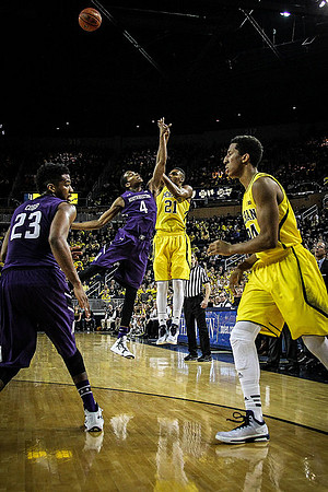 Zak Irvin (21) and Aubrey Dawkins (24)