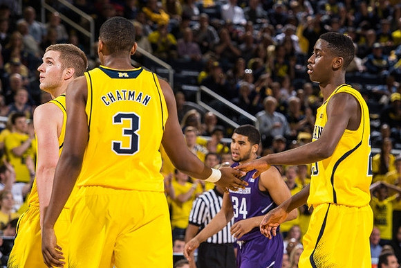 Max Bielfeldt (44), Kameron Chatman (3), and Caris LeVert (23)
