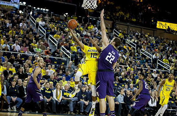Muhammad-Ali Abdur-Rahkman (12) and Zak Irvin (21)
