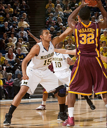Jon Horford (15) and Tim Hardaway Jr. (10)