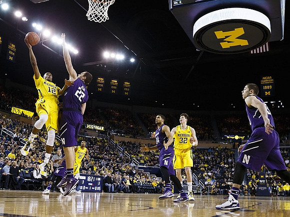 Muhammad-Ali Abdur-Rahkman (12), Zak Irvin (21), and Ricky Doyle (32)
