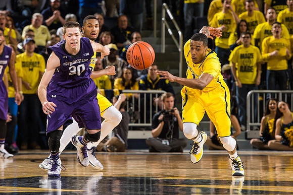 Zak Irvin (21) and Muhammad-Ali Abdur-Rahkman (12)