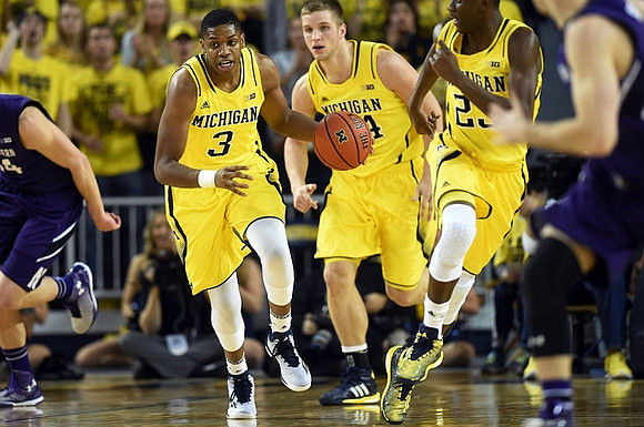 Kameron Chatman (3), Max Bielfeldt (44), and Caris LeVert (23)