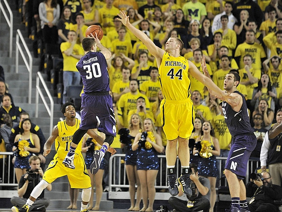 Derrick Walton Jr. (10) and Max Bielfeldt (44)