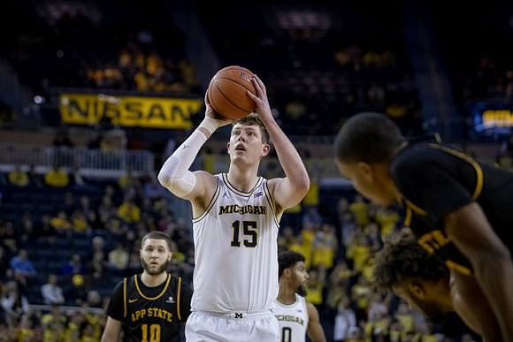 Jon Teske (15) and David DeJulius (0)
