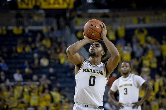 David DeJulius (0) and Zavier Simpson (3)