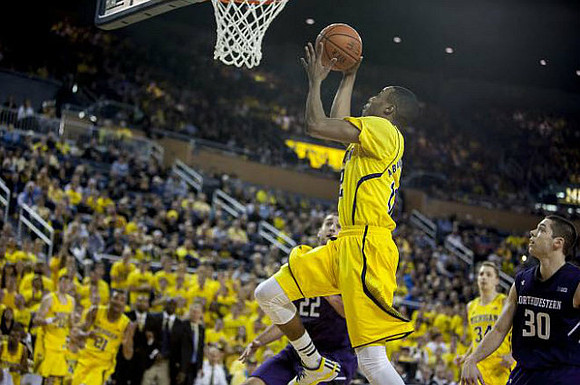 Muhammad-Ali Abdur-Rahkman (12), Zak Irvin (21), and Mark Donnal (34)