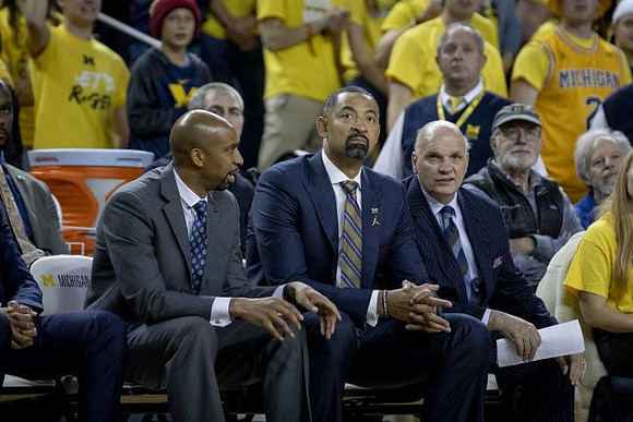 Saddi Washington, Juwan Howard, and Phil Martelli