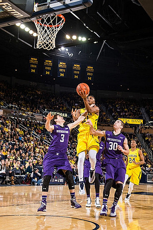 Zak Irvin (21) and Aubrey Dawkins (24)