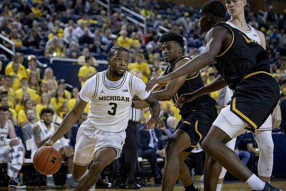 Zavier Simpson (3) and Colin Castleton (11)