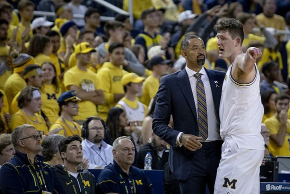 Juwan Howard and Jon Teske (15)